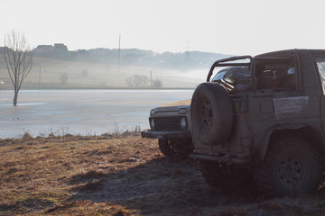 Ukrainian offroad competition in the city of Kamyanets Podilsky. Swamp and mud on cars. Produce large puddles