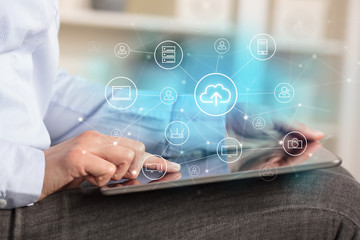 Business woman using tablet with network security and online storage system concept
