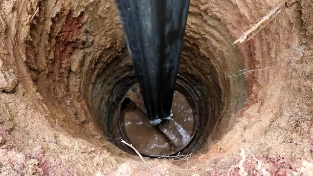 Water Well Drilling, holes boring in ground with drilling rig machine