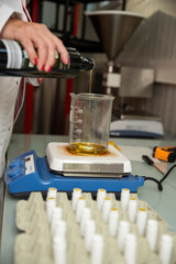 Hives in an apiary with bees flying to the landing boards. Apiculture
