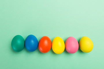 easter eggs on green background