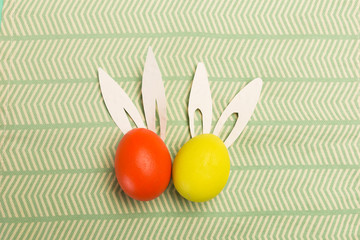 easter eggs on green background