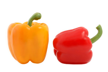Yellow and red ripe peppers - isolated