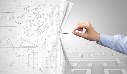 Hand pulling paper curtain, changing scene concept