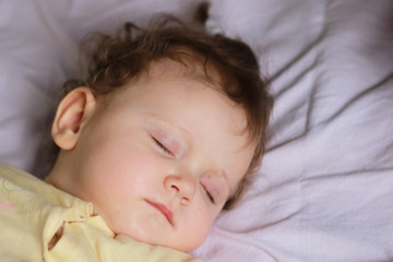 Newborn baby face closeup.