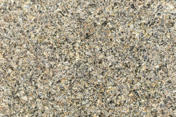 Marble texture with different colored spots. The surface of granite stone with streaks, spots and patterns of different colors. Visible stone texture with thick lines and mottled spots. 