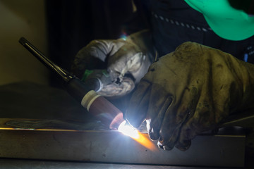 Welding by TIG.