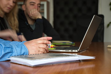 Fototapeta na wymiar People in the office using laptop