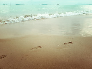 footprints on the beach