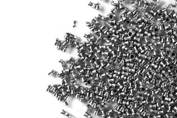 Lead pellets for air rifle isolated on white background and texture, top view