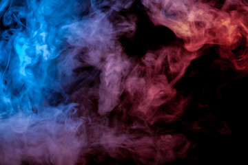 Beautiful horizontal column of smoke in the neon bright light of blue pink and orange on a black...