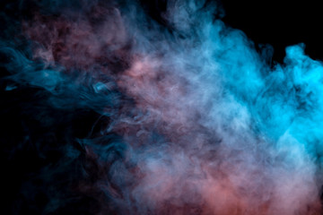 Obraz na płótnie Canvas Background of orange, purple, red and blue wavy smoke on a black isolated ground. Abstract pattern of steam from vape of smoothly rising clubs. Mocap and print for t-shirt.