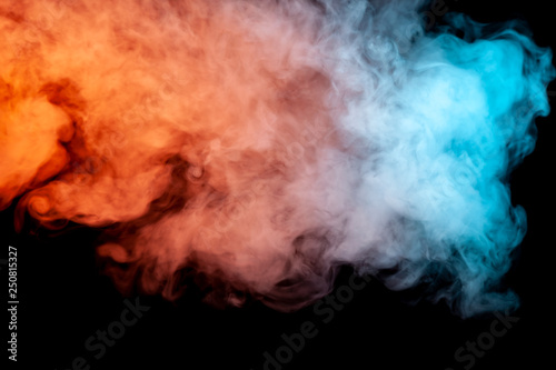Background Of Orange Purple Red And Blue Wavy Smoke On A Black