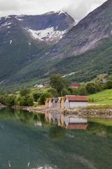 Fototapeta na wymiar huts near the lake of Flo, Norway