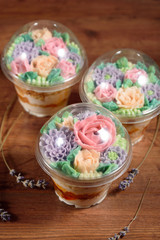 Delicious, appetizing, fragrant dessert. Triple delicious light dessert, decorated with oil flowers.