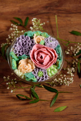 Delicious, appetizing, fragrant dessert. Triple delicious light dessert, decorated with oil flowers.