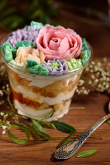 Delicious, appetizing, fragrant dessert. Triple delicious light dessert, decorated with oil flowers.