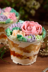 Delicious, appetizing, fragrant dessert. Triple delicious light dessert, decorated with oil flowers.