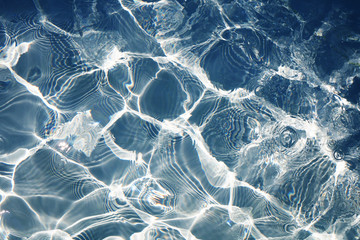 Pattern in blue swimming pool texture for background, closeup