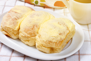 Bread with butter sugar on top.