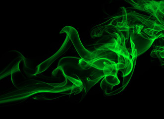 Abstract green smoke on black background, darkness concept