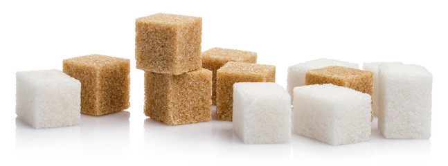 White and brown sugar cubes, isolated on white background