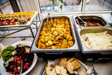 bruschetta, quiche loren, mini burger at catering event on some festive event, party or wedding reception