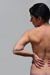 middle aget woman with low back pain