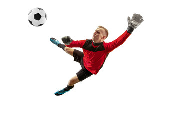 Male soccer player goalkeeper catching ball in jump. Silhouette of fit man with ball isolated on white studio background