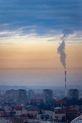 Obraz premium Cityscape and view to the city central heating plant in the winter season