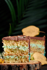 Chic cake with chocolate and pear cream. Delicious cake for the holiday decorated with pear.