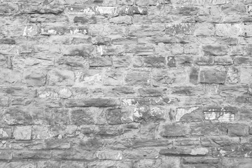 Black and white photo of a stone wall