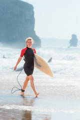 Woman with surfboard