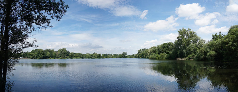 panoramic view of idyllic bathing lake in Germany