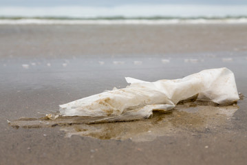 Fototapeta na wymiar plastic film on the beach