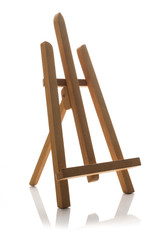 Wooden easel isolated on white background