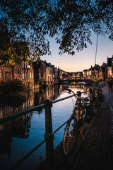 typical street near the river in Gent at blue hour, Belgium