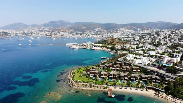 Aerial view of sunny Bodrum with resorts and beachfront villas, Turkey