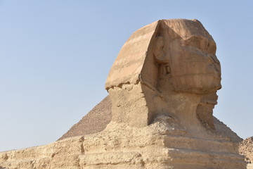 Fototapeta na wymiar Great Sphinx Foreground, Great Pyramid Background, Giza, Egypt