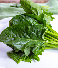 Bunch of green fresh organic spinach leaves