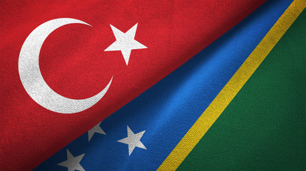 Turkey and Solomon Islands two flags textile cloth, fabric texture