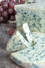 Fourme Ambert and Blue Auvergne semi-hard AOP French blue cheeses made from raw cow milk in Auvergne, France