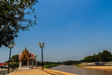 Beautiful landscape and Buddhist church exterior of Wat tha Luang temple, the famous public temple and located on the shore of Nan river, Phichit province, Thailand.