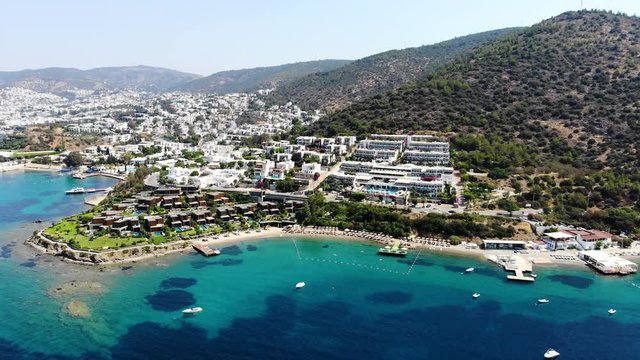 Aerial view of sunny Bodrum with resorts and beachfront villas, Turkey