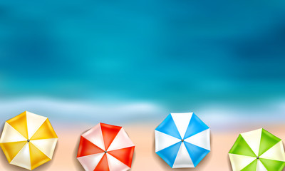 beautiful summer background with sea, beach and colourful parasols from above