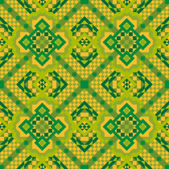 Seamless geometric pattern in green and yellow. Template for design fabrics and clothes.