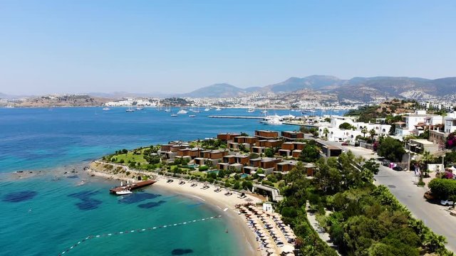 Aerial view of sunny Bodrum with resorts and beachfront villas, Turkey