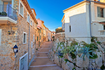 Fototapeta na wymiar Mediterranean stone street of Antibes view