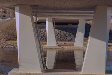 Reflection under the bridge