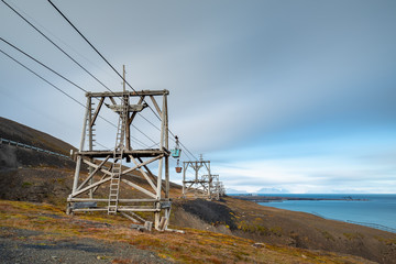 Fototapeta na wymiar Old cableway for transporting coal from mines in Longyearbyen - the most Northern settlement in the world. Svalbard, Norway